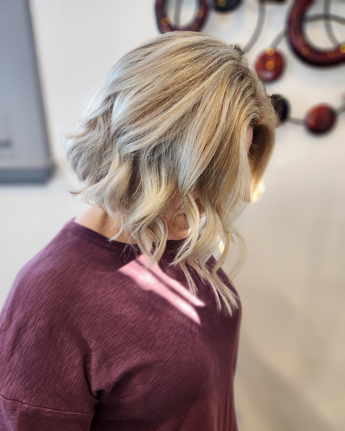 blonde short titled head