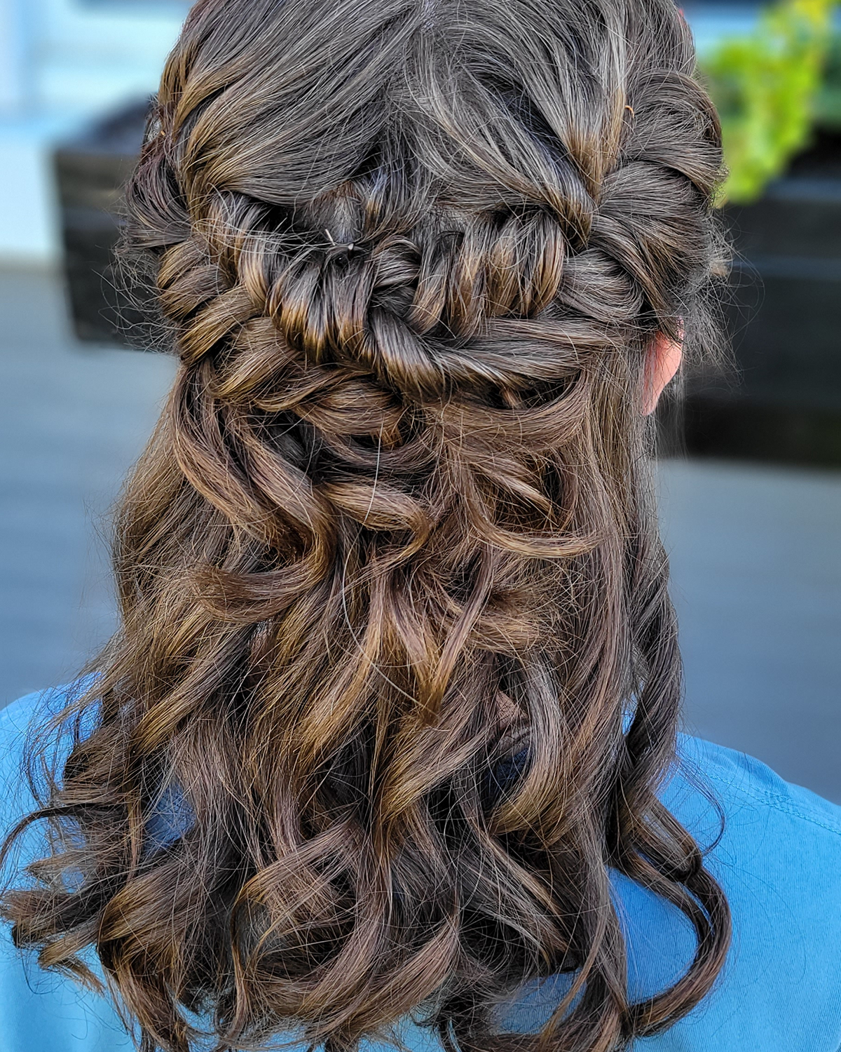 brown hair done up with curls