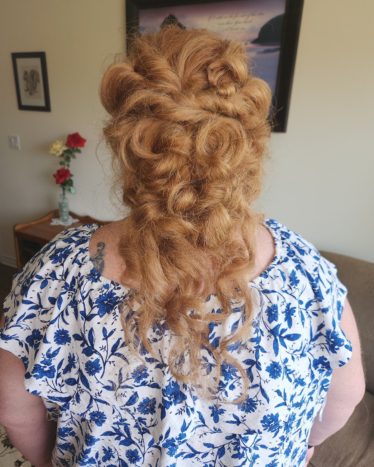 curly orange hair styled