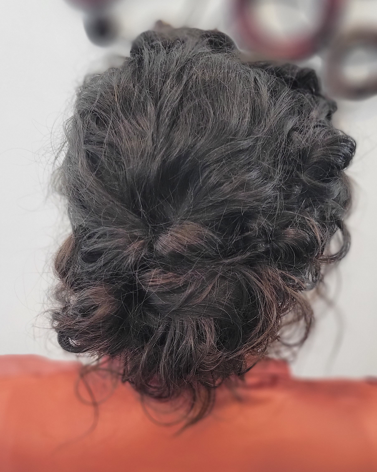 dark brown hair in updo style back view