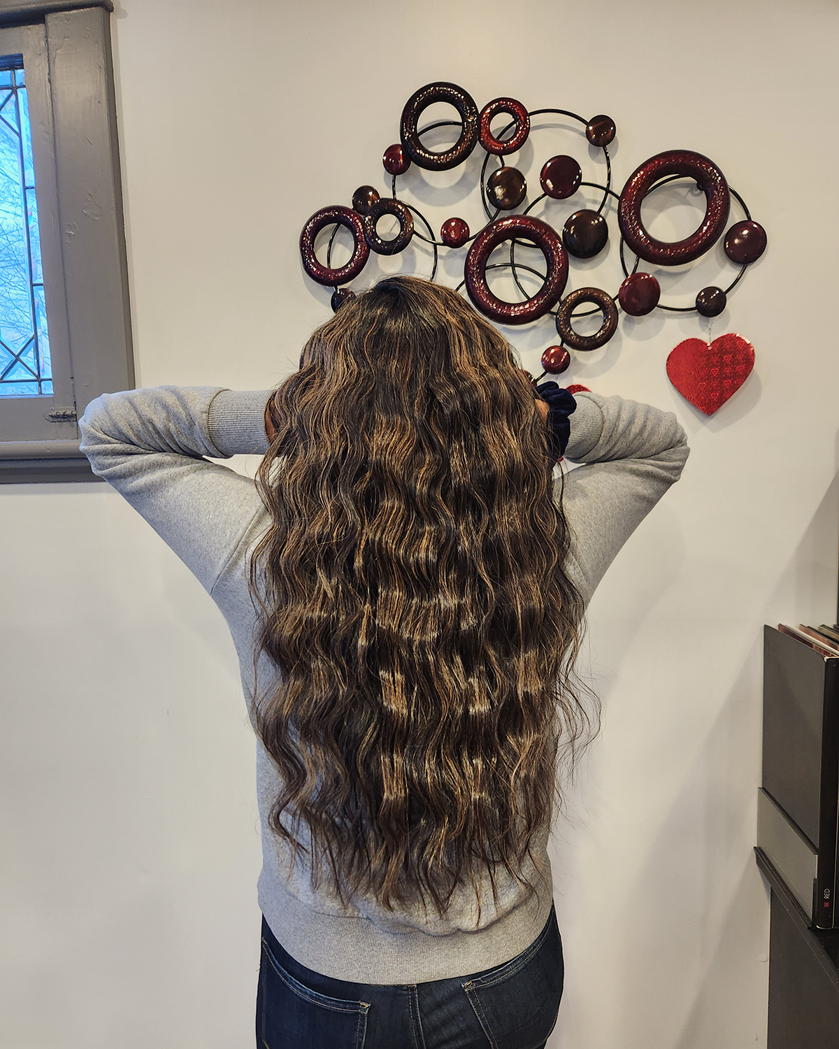 long dark brown hair with wavy curls back view